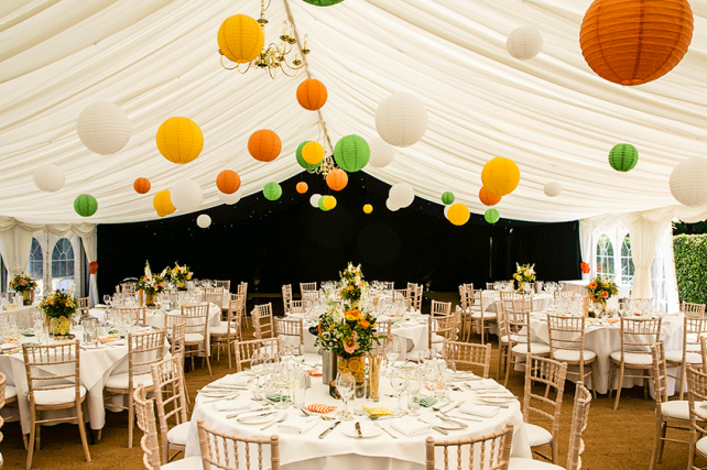 Brighten a white marquee with summery coloured lanterns