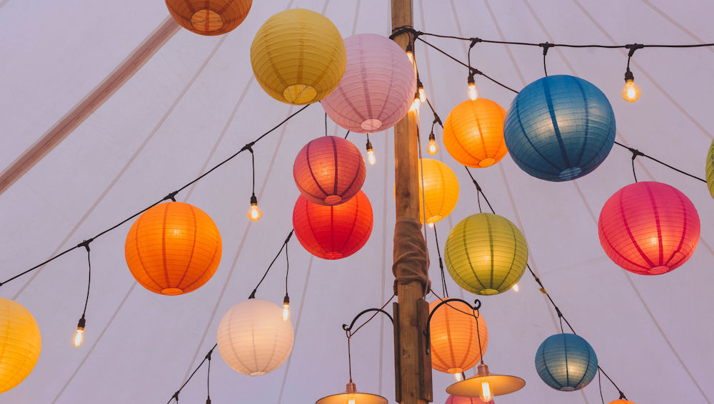 Coloured paper lanterns and festoon lights