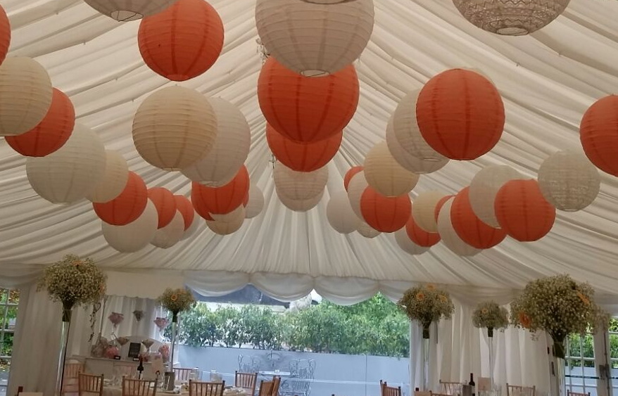 Peach and cream lanterns at The Woodlands Hotel