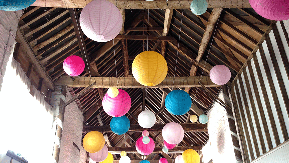 bright mad hatters decorations and paper lanterns