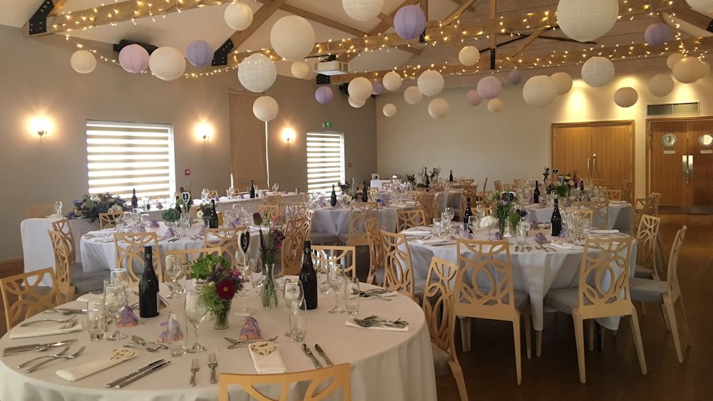 The Boathouse decorated with Lavender and Lilac Hanging Lanterns